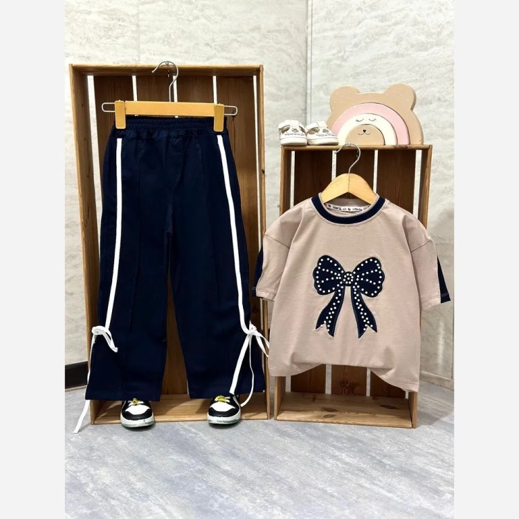 بلوز و شلوار دخترانه پنبه لاکرا طرح پاپیون مروارید مناسب 3 تا 14 سال